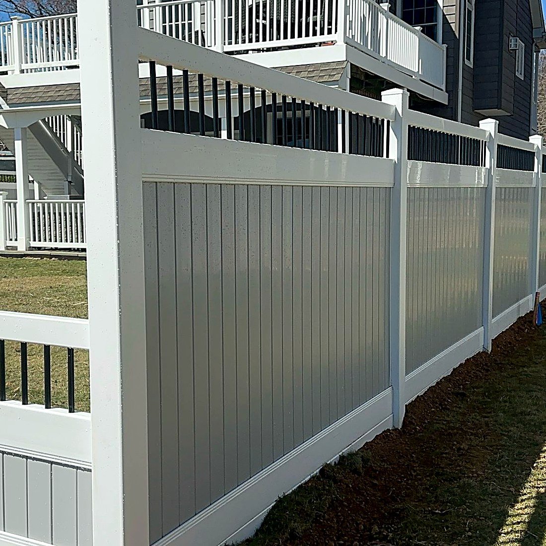 Privacy fence panel by commercial building